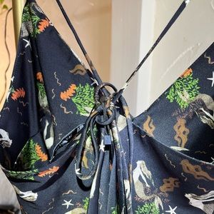 Silky Zara mermaid mini dress with adjustable straps and modern design